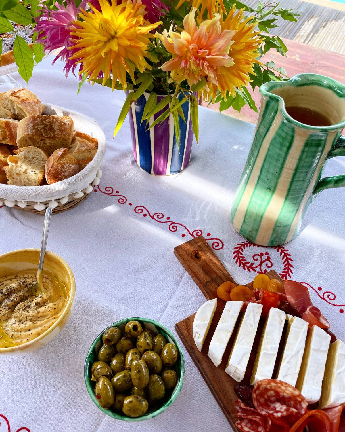 Blue and purple striped ceramic pitcher
