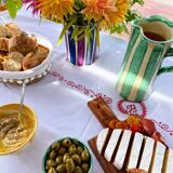 Blue and purple striped ceramic pitcher