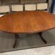 Oval Scandinavian teak dining table with central extension