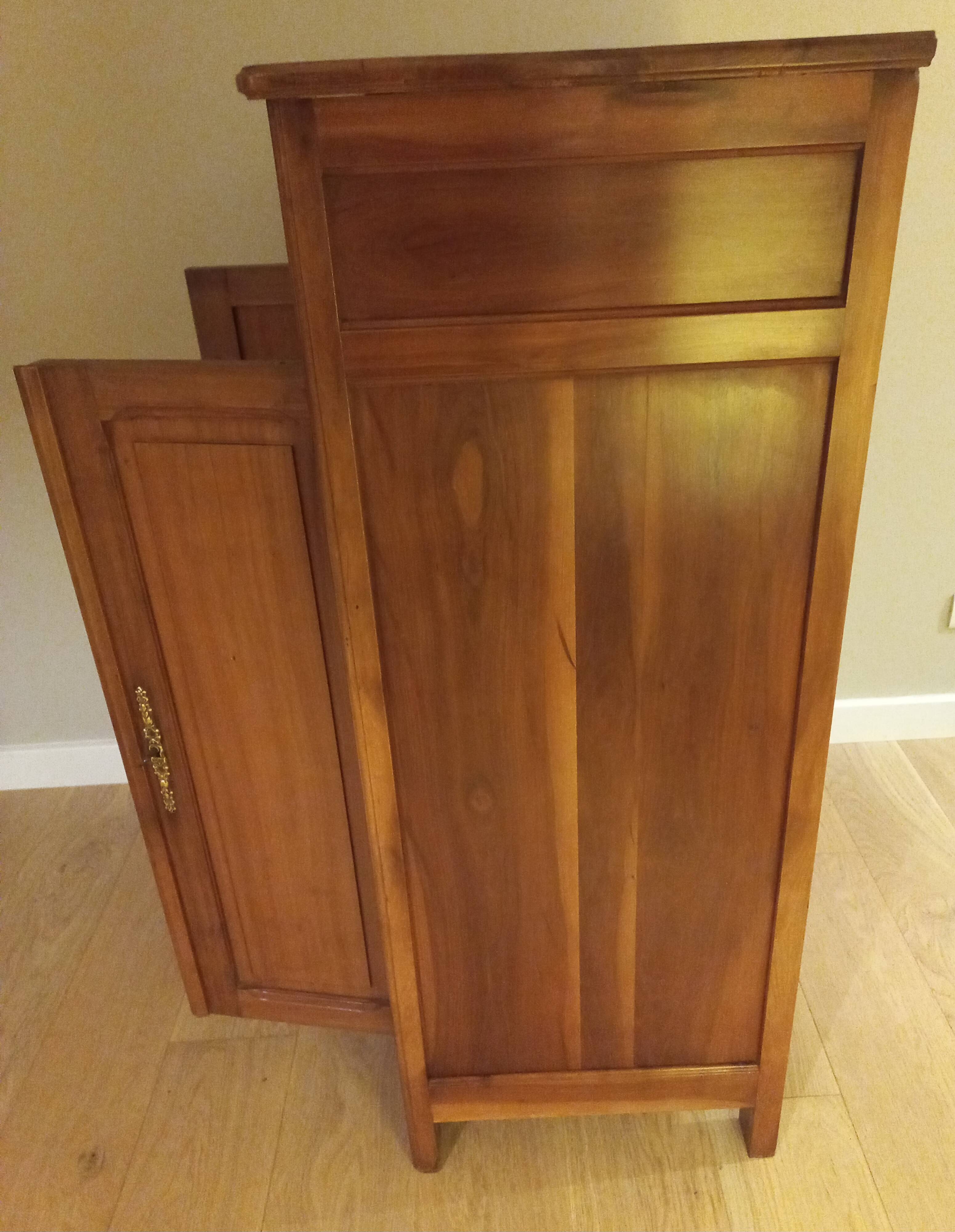 Small table and cherry wood sideboard.
