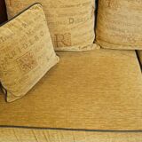 Luxurious and spacious two-seater sheepskin sofa of top quality with fabric cushions