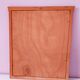 Beveled glass wall mirror in solid wood frame