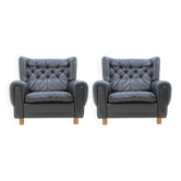 Ensemble de fauteuils en cuir noir des années 1970.