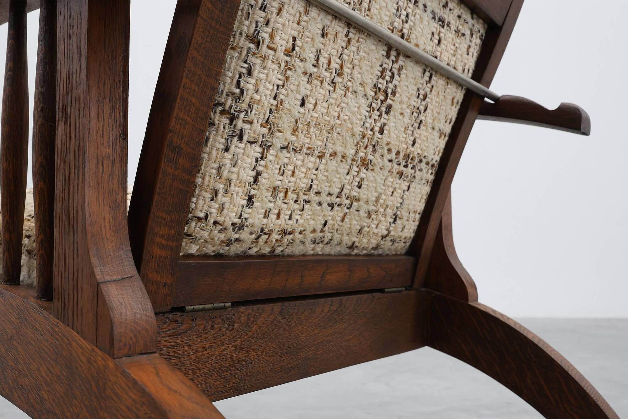 Arts & Craft oak armchair with spindle sides and tweed upholstery, Belgium