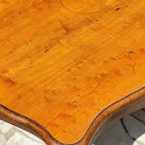 Solid wood table with curved legs