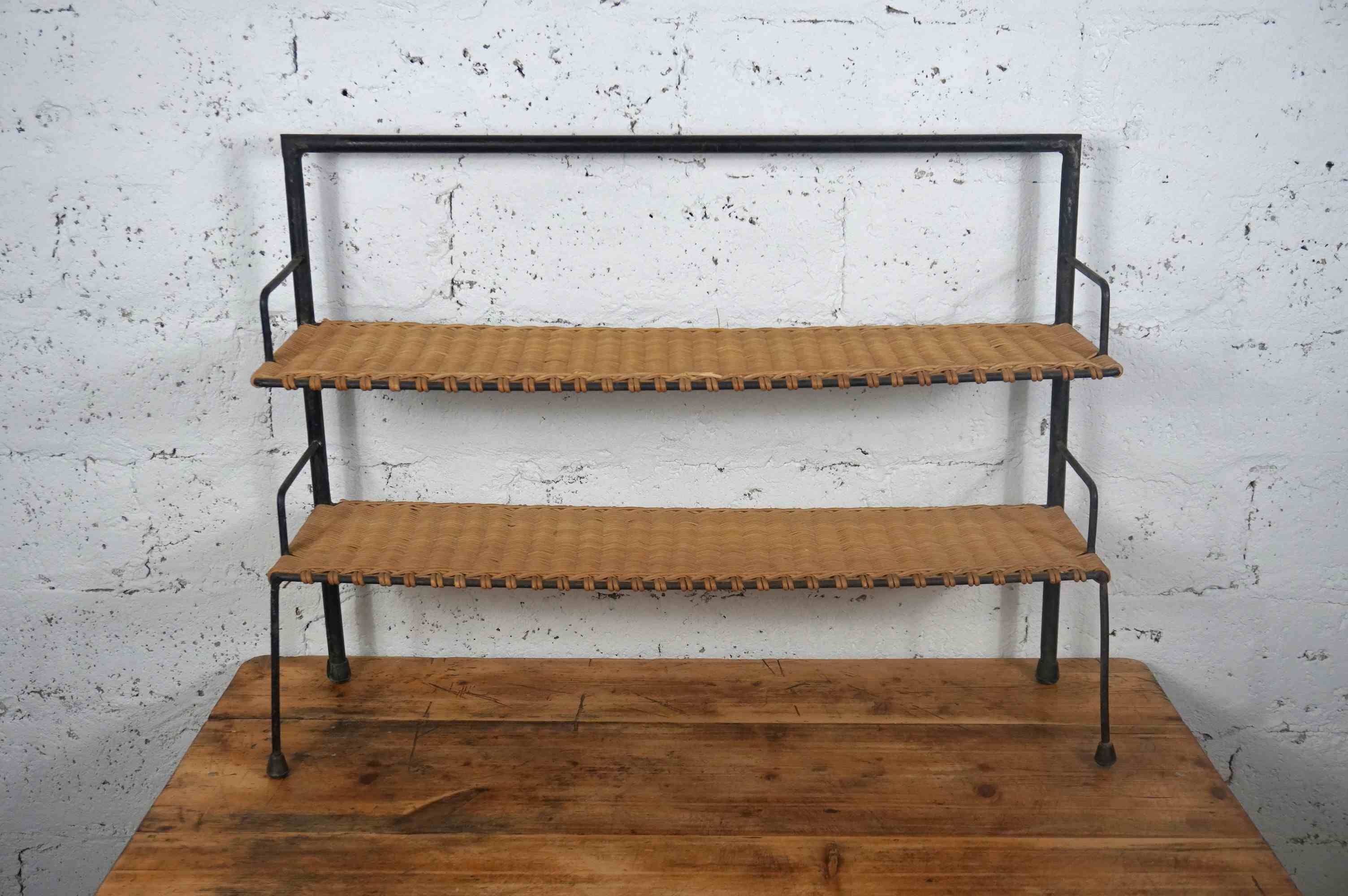 low metal and rattan shelf from the 50s