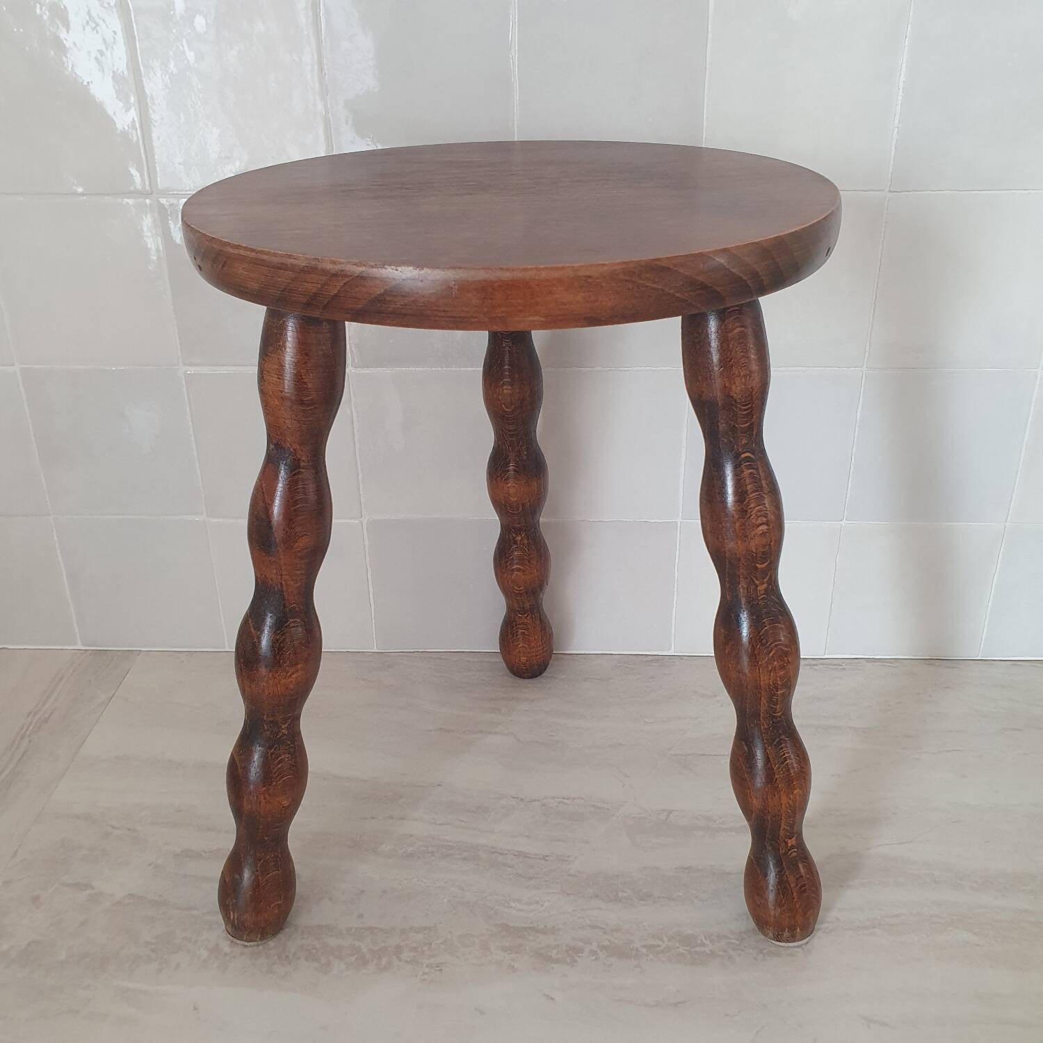 Turned wooden stool / tripod with round seat