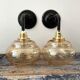 Pair of vintage sconces in electrified golden glass to nine