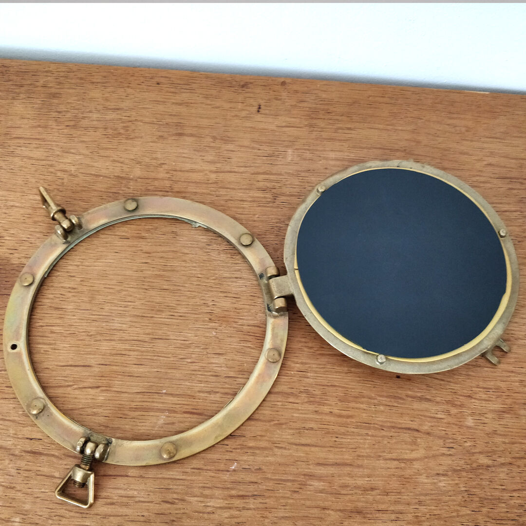 Brass window mirror 21cm diameter