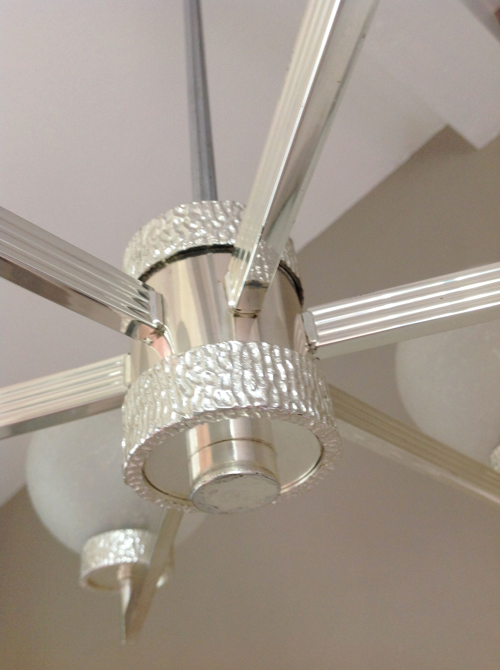 Six-light chrome metal chandelier and opaque glass globes / vintage 60s and 70s