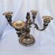 Pair of candlesticks in silver metal