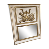 Mirror decorated with weapons