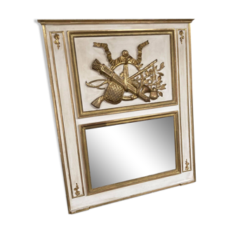 Mirror decorated with weapons