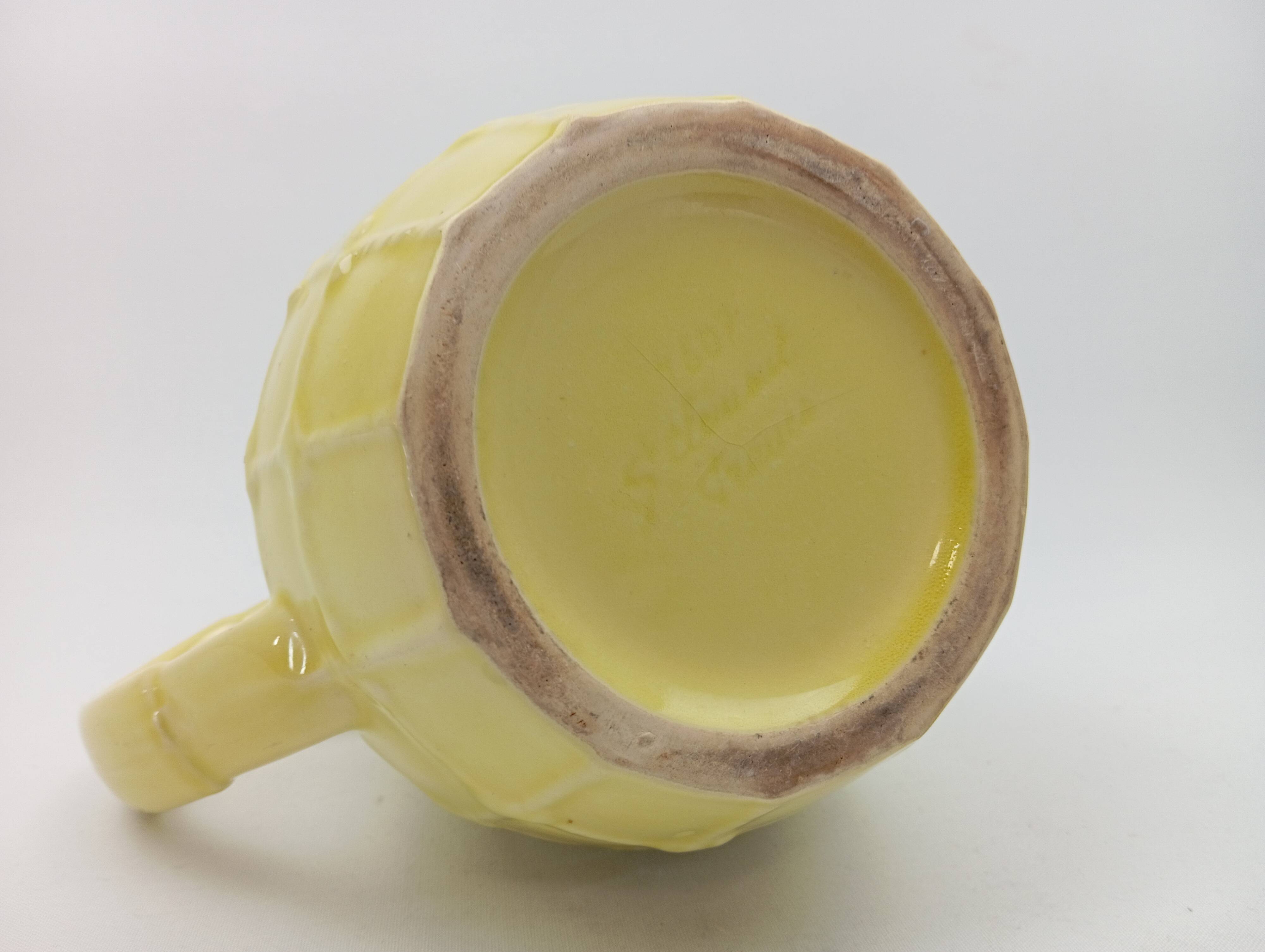 Saint Clément cruche à eau jaune à effet tressé