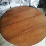 Six-legged round cherry table