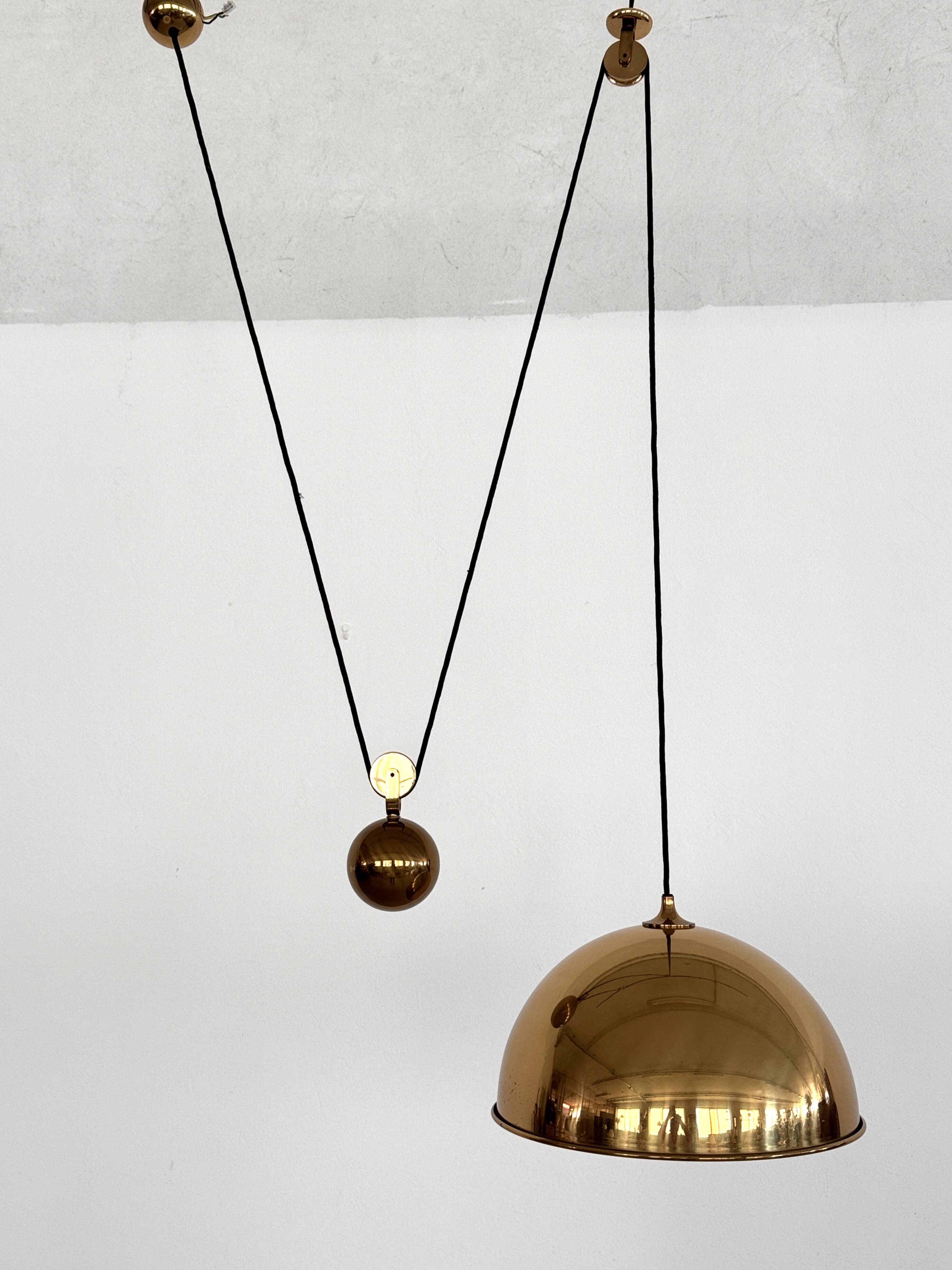 Florian Schulz Brass Pendant with Rotary Wheels and Counterweigh