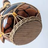 Amber glass carafe woven with wicker wooden handle