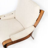 Armchair in rosewood and upholstered with light fabric, of Danish design, 1960s