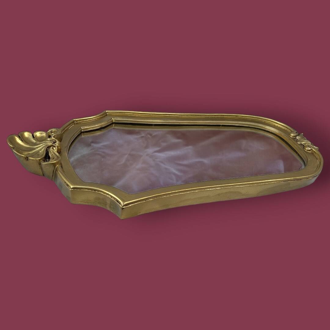 Antique wall mirror in gilded resin – back in red velvet