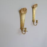 Pair of Art Deco brass wall sconces by Holmström, Arvika, Sweden, 1940s.