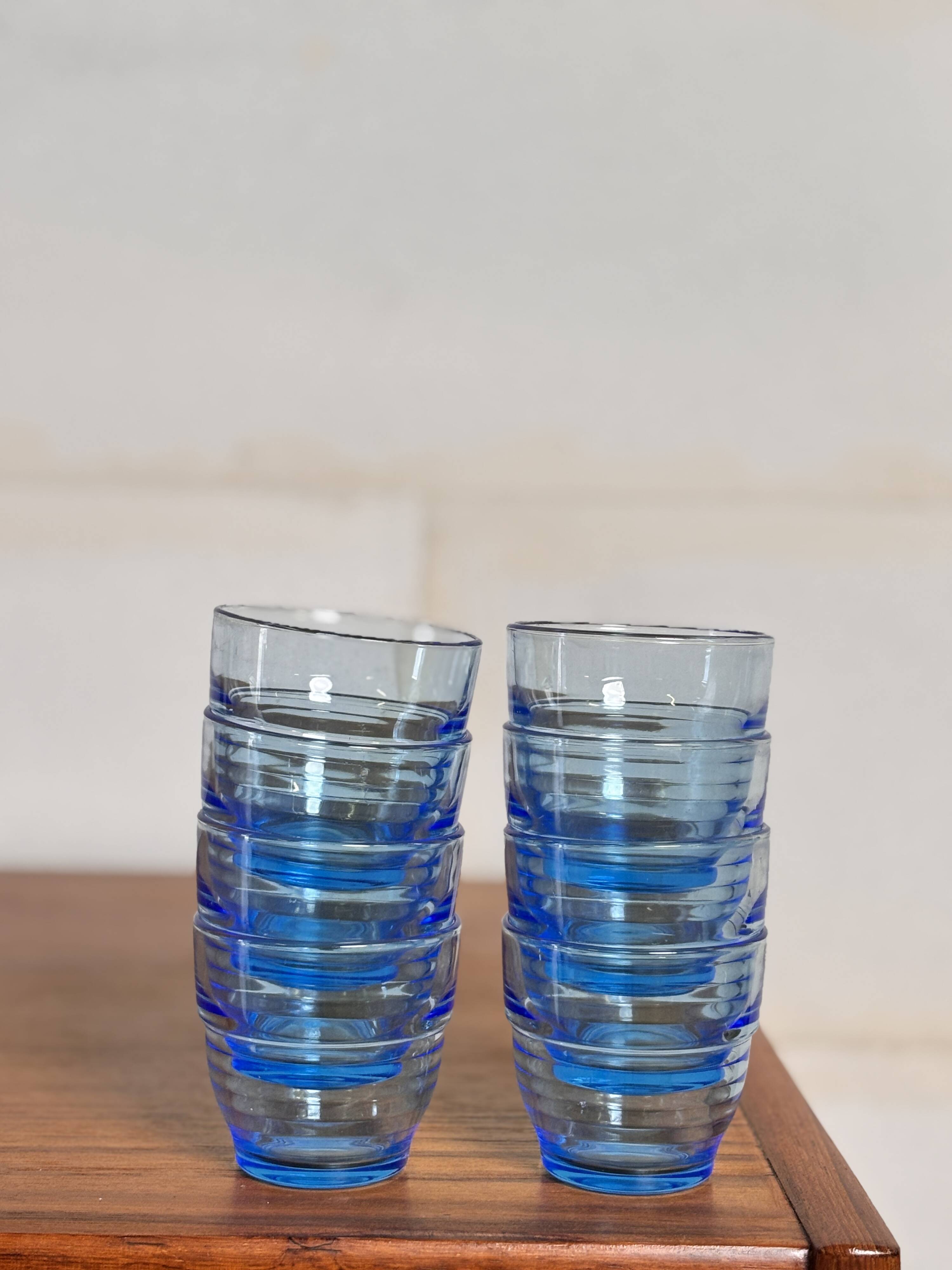 Set of 8 blue Arco France glasses.