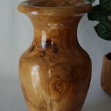 Artisanal vase in wood turned from varnished olive tree
