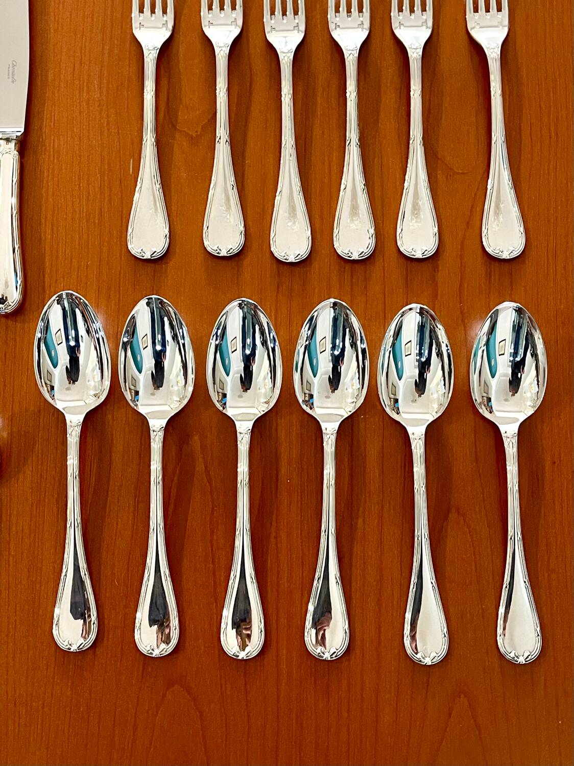 Christofle crossed ribbons, cutlery set for 6 people in new condition, 24 pieces.