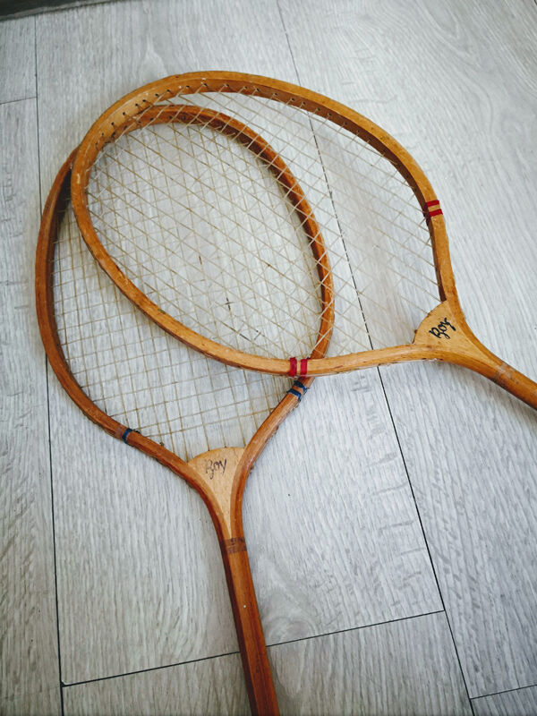 Pair of old wooden badminton rackets