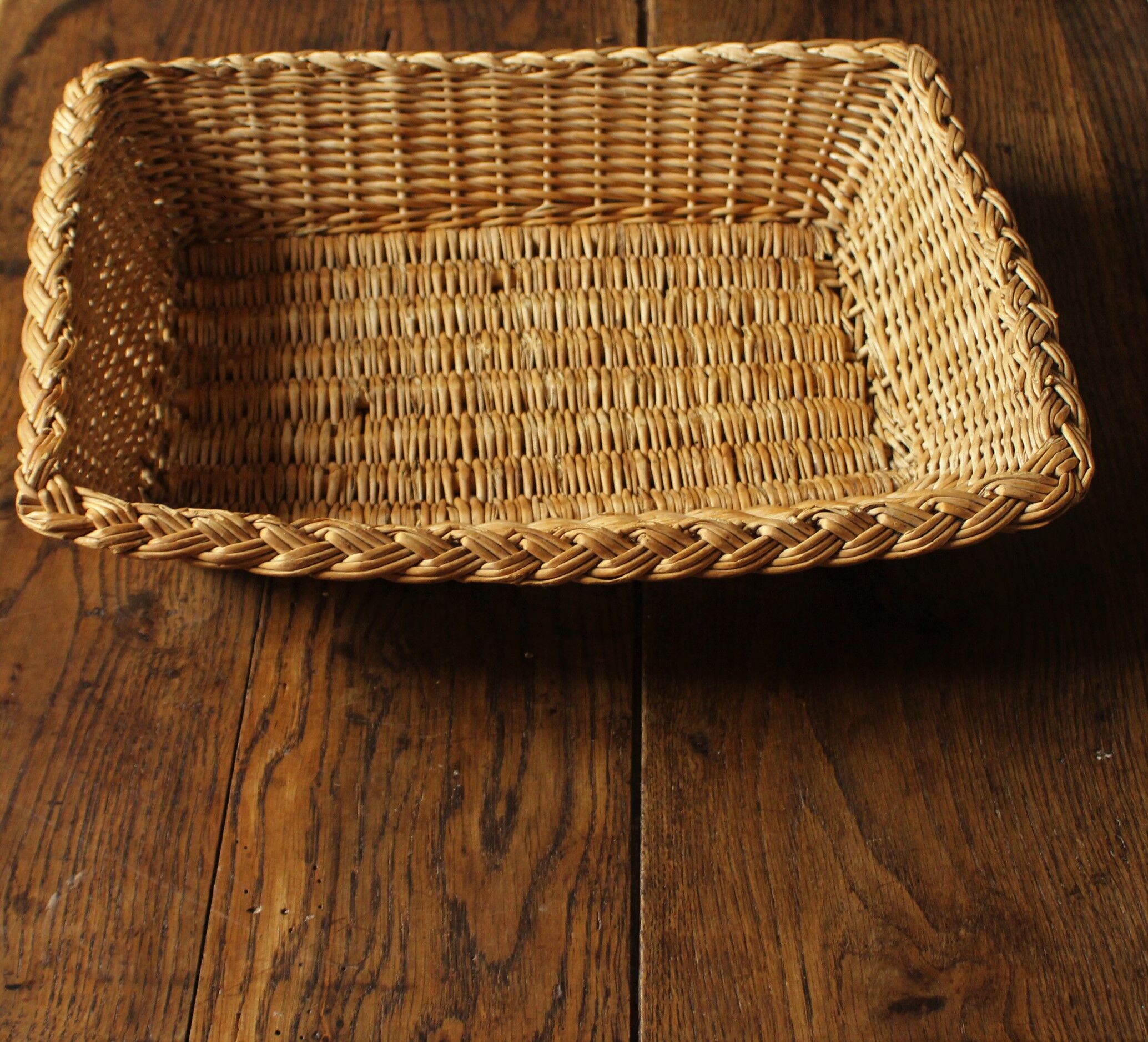 Braided wicker basket basket
