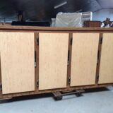 Old fridge behind wooden bar