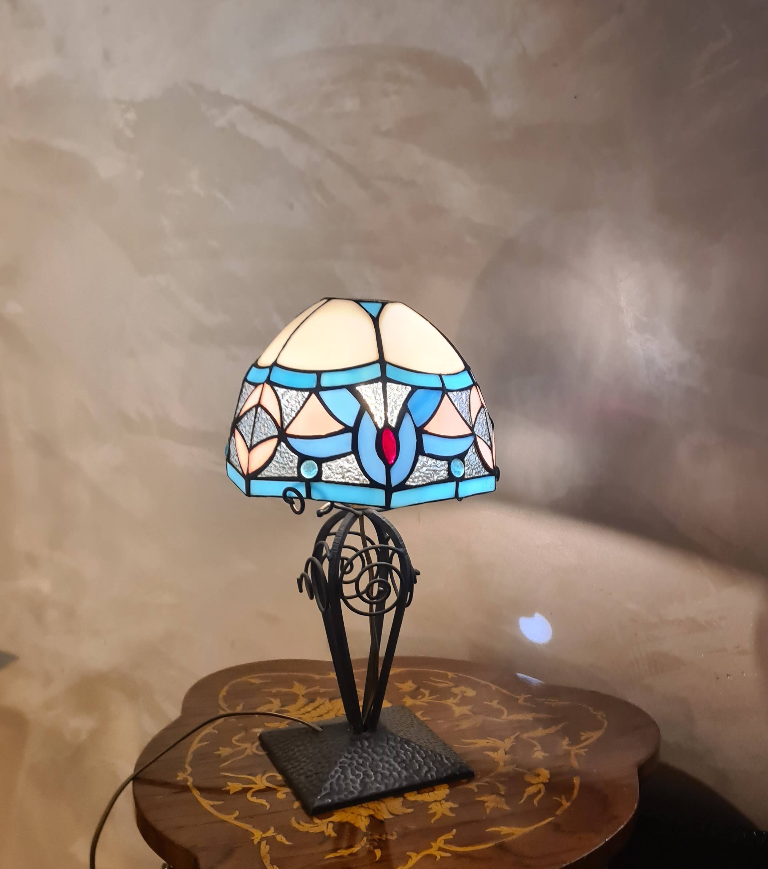 antique wrought iron lamp, 1900 to 1930 with stained glass lampshade soldered with lead