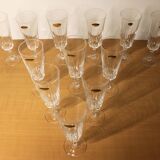 Ensemble de 12 flûtes à champagne, modèle “Versailles”, Cristal d’arques, 70’s.