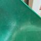 A shell chair by Pierre Guariche for Meurop in vintage green from the 1960s.