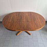 Baumann dining table 1960 extendable from 114 to 167 cm with integrated extensions.