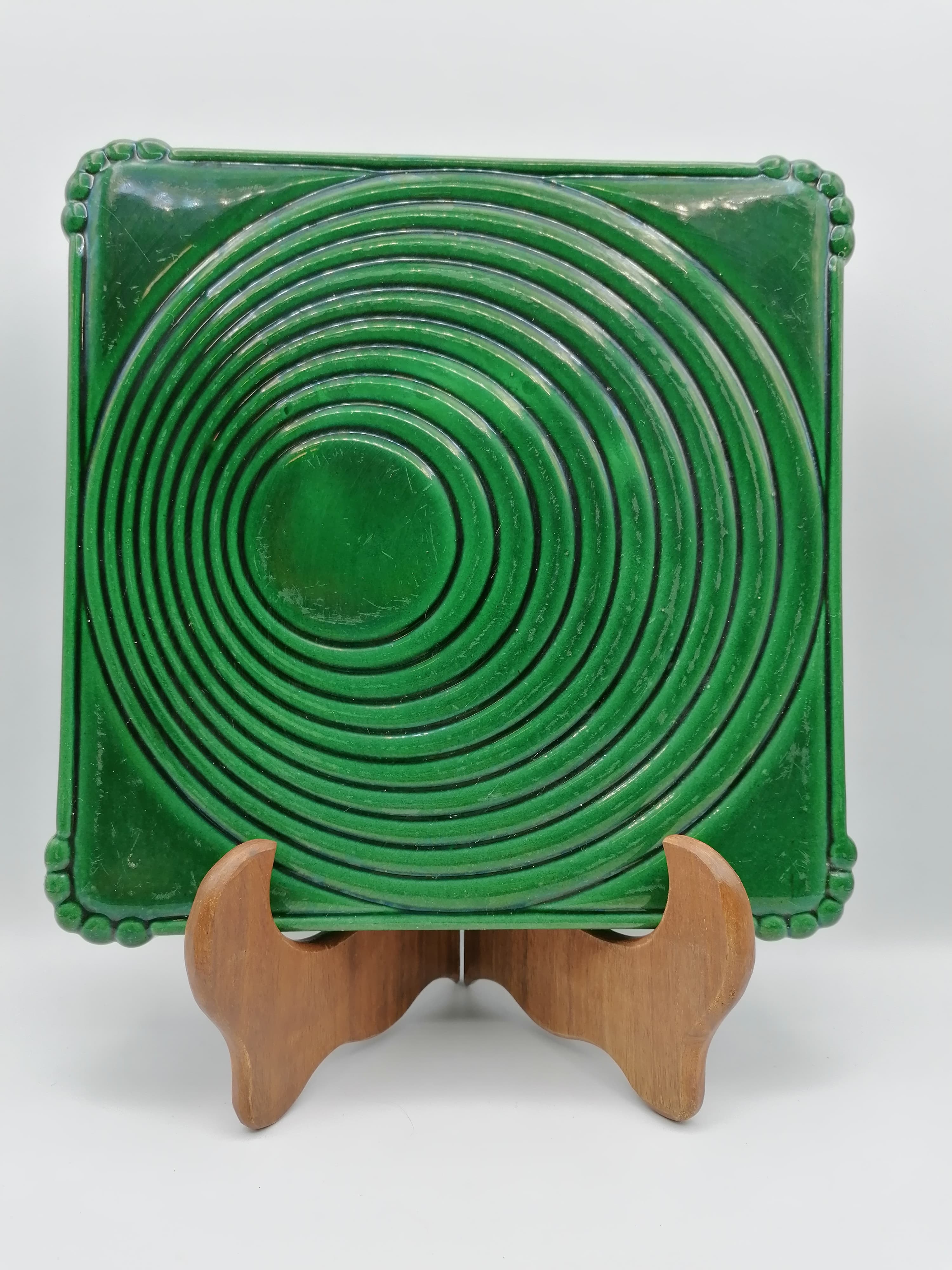 Under the plate and 3 under the bottle