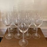 Set of 9 tall twisted and engraved crystal wine glasses