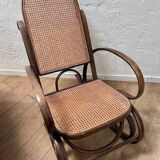 Curved wooden rocking chair