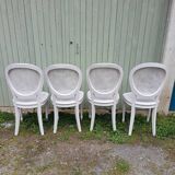 4 old wooden and cane chairs