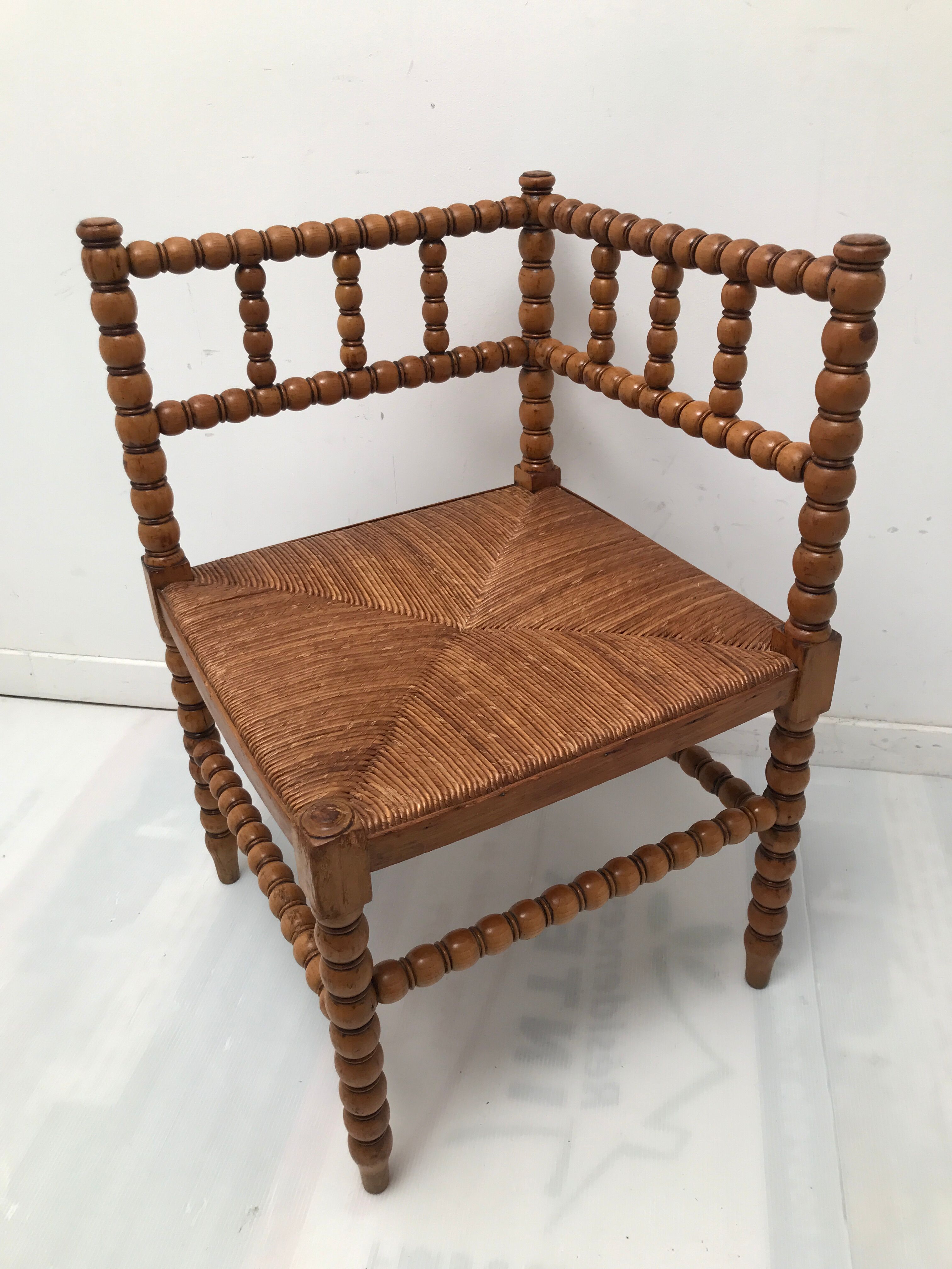 A wooden corner chair turned 1920s