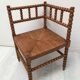 A wooden corner chair turned 1920s