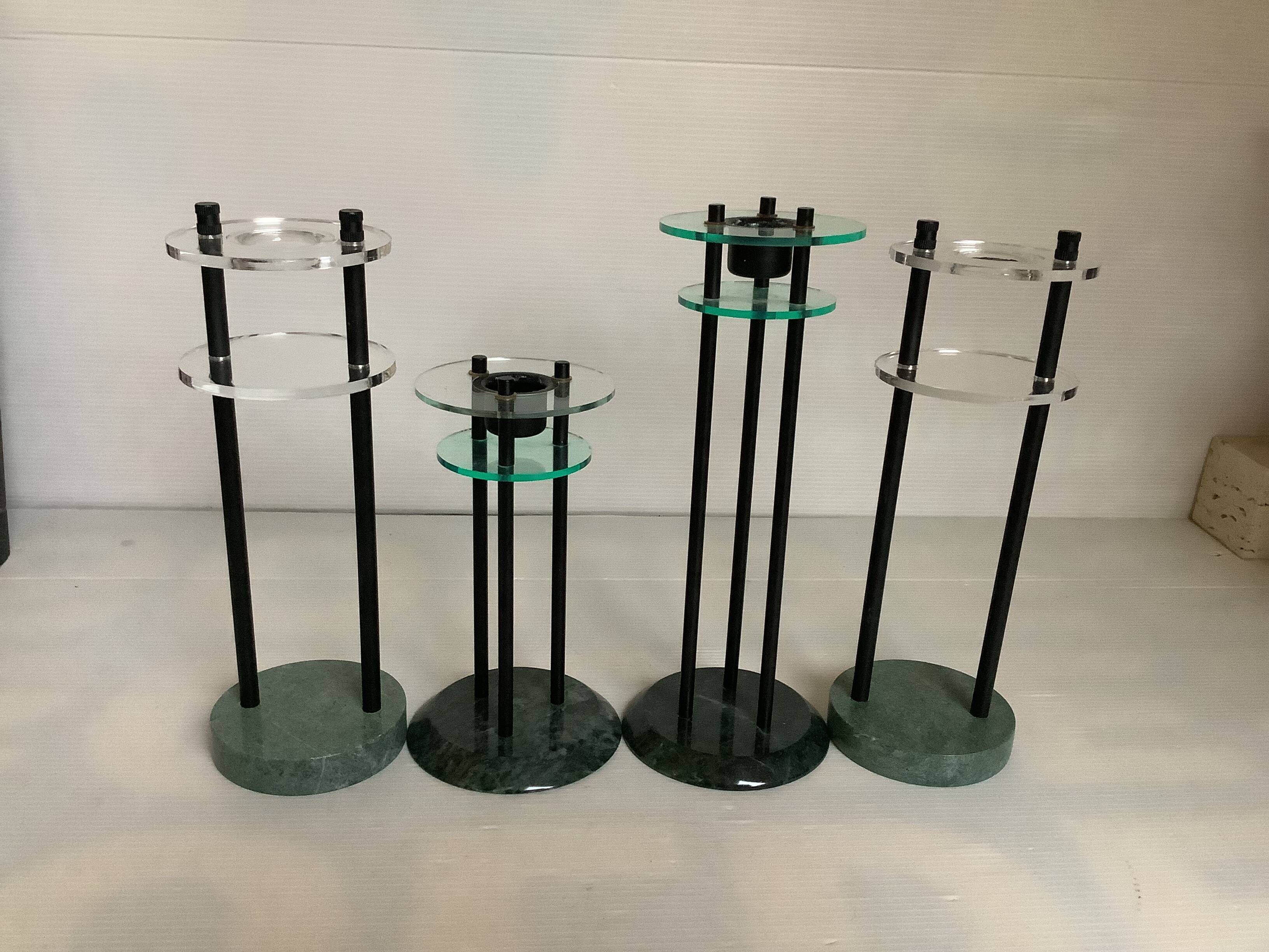 Four postmodernist green marble candlesticks