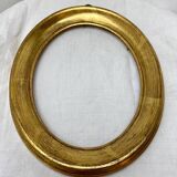 Old oval shaped wooden frame