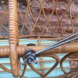 Rattan bassinet with hood arches