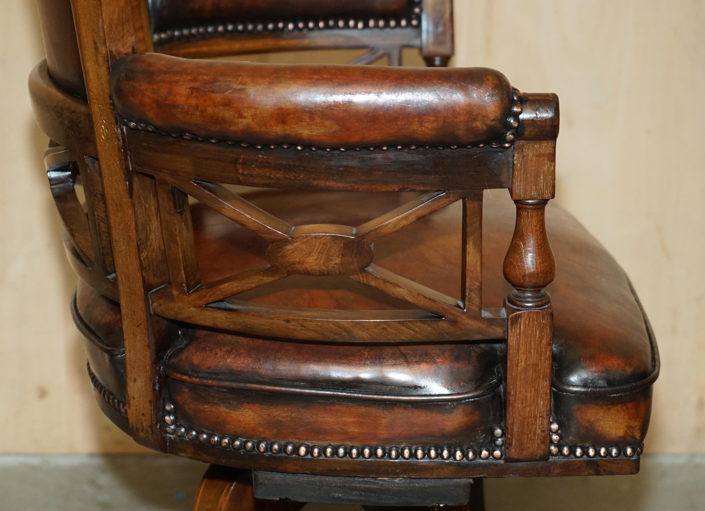 Victorian captain's chair in leather restored by Cornelius V Smith.