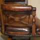 Victorian captain's chair in leather restored by Cornelius V Smith.