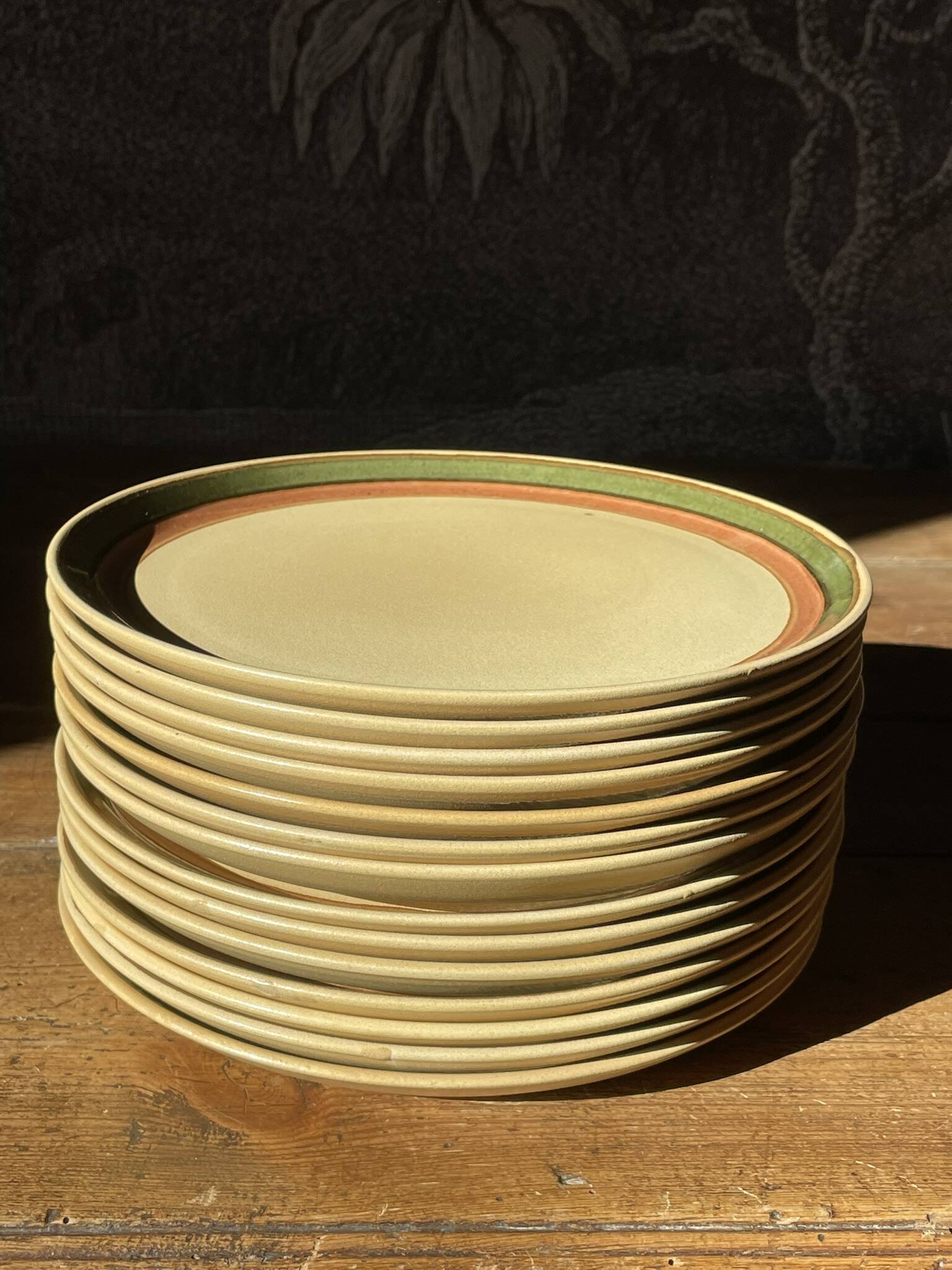 14 stoneware dinner plates, 1970