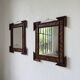 Pair of wooden mirrors in tramp art style