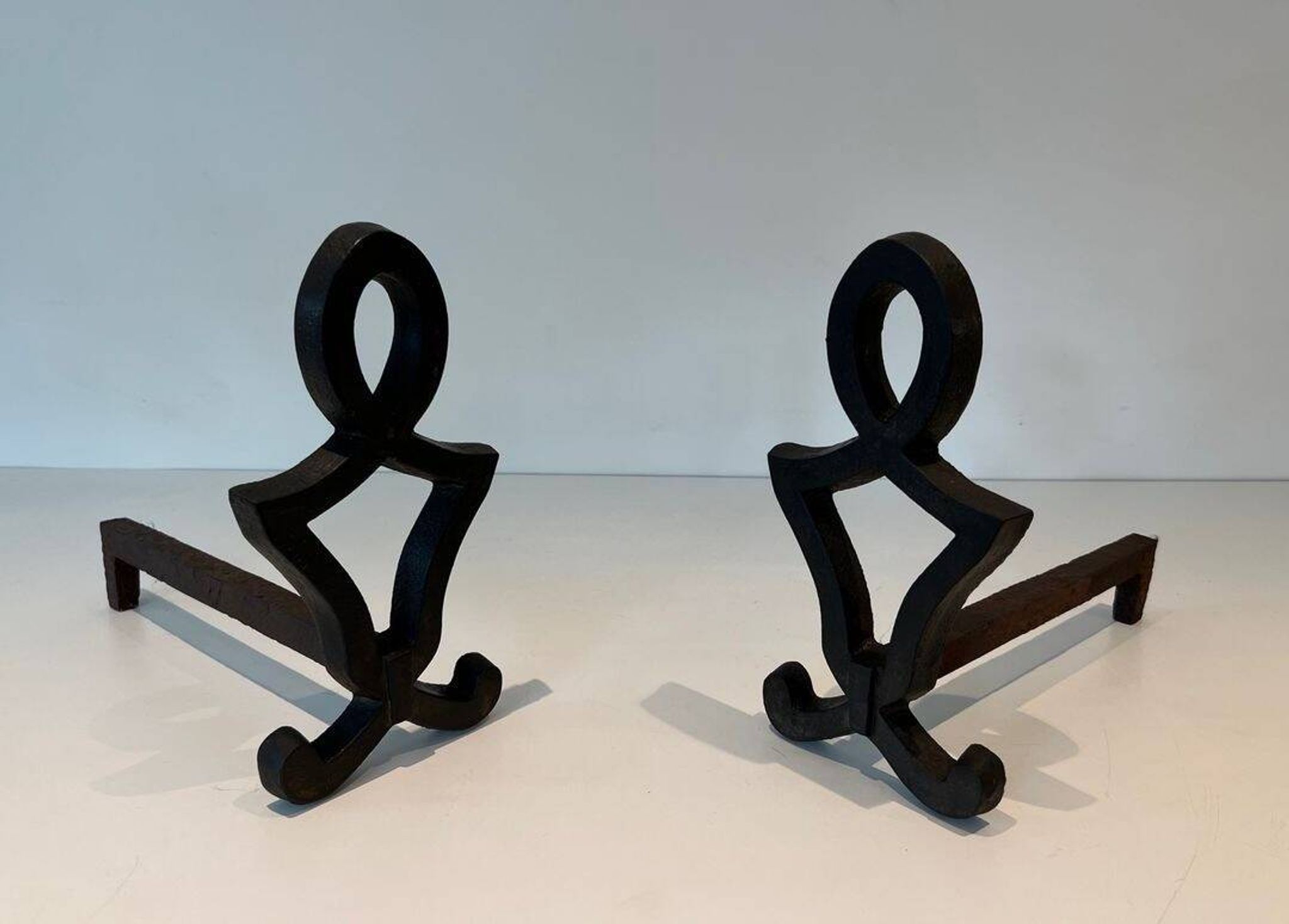 Pair of Cast Iron Chenets with Figurative Anthropomorphic Silhouette, by Raymon