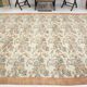 Tapis en laine et coton à décor floral