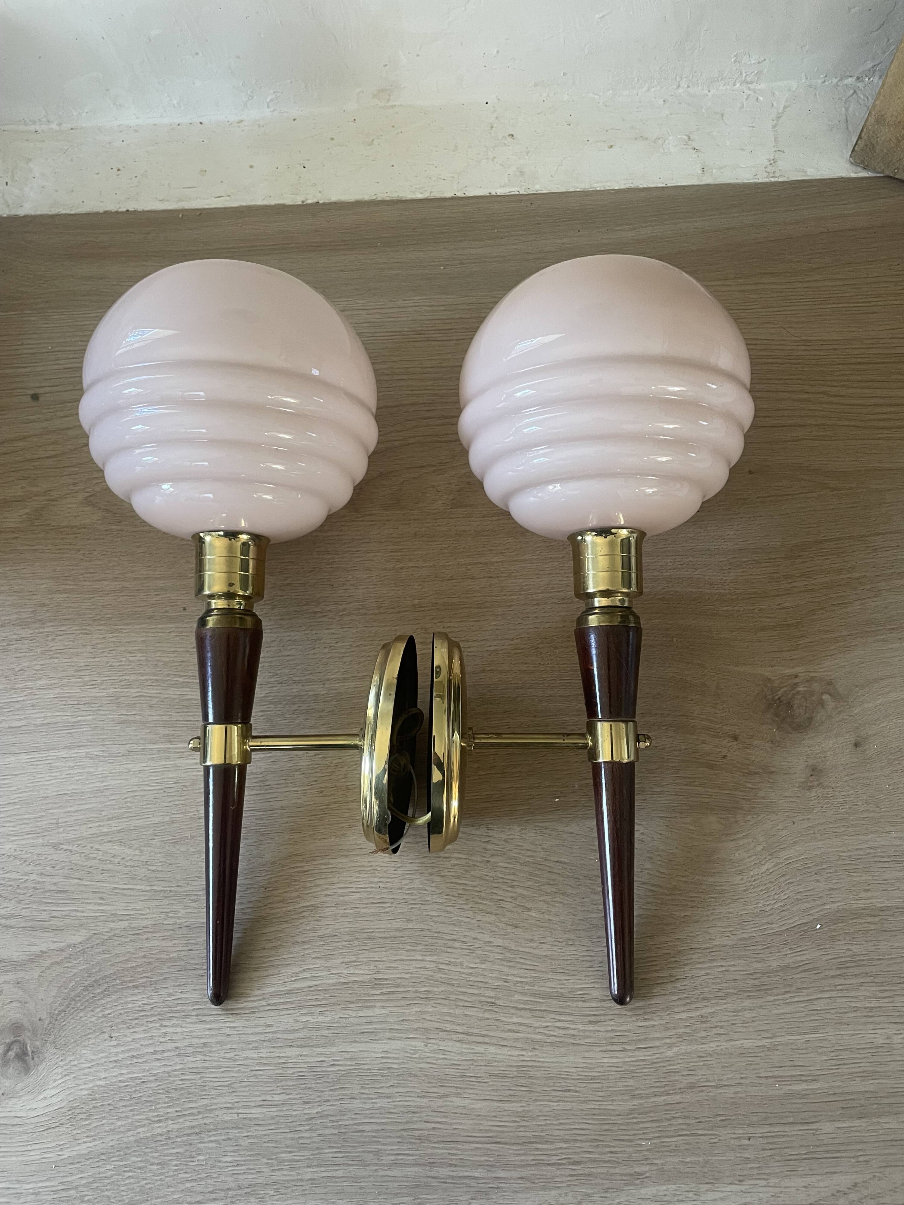 Pair of wall lights in wood, brass, and pink opaline.